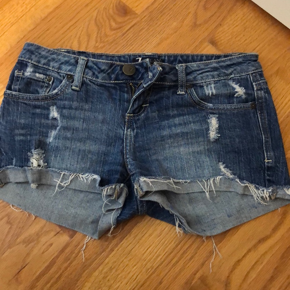 Distressed denim shorts